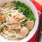 A bowl of Thai chicken noodle soup