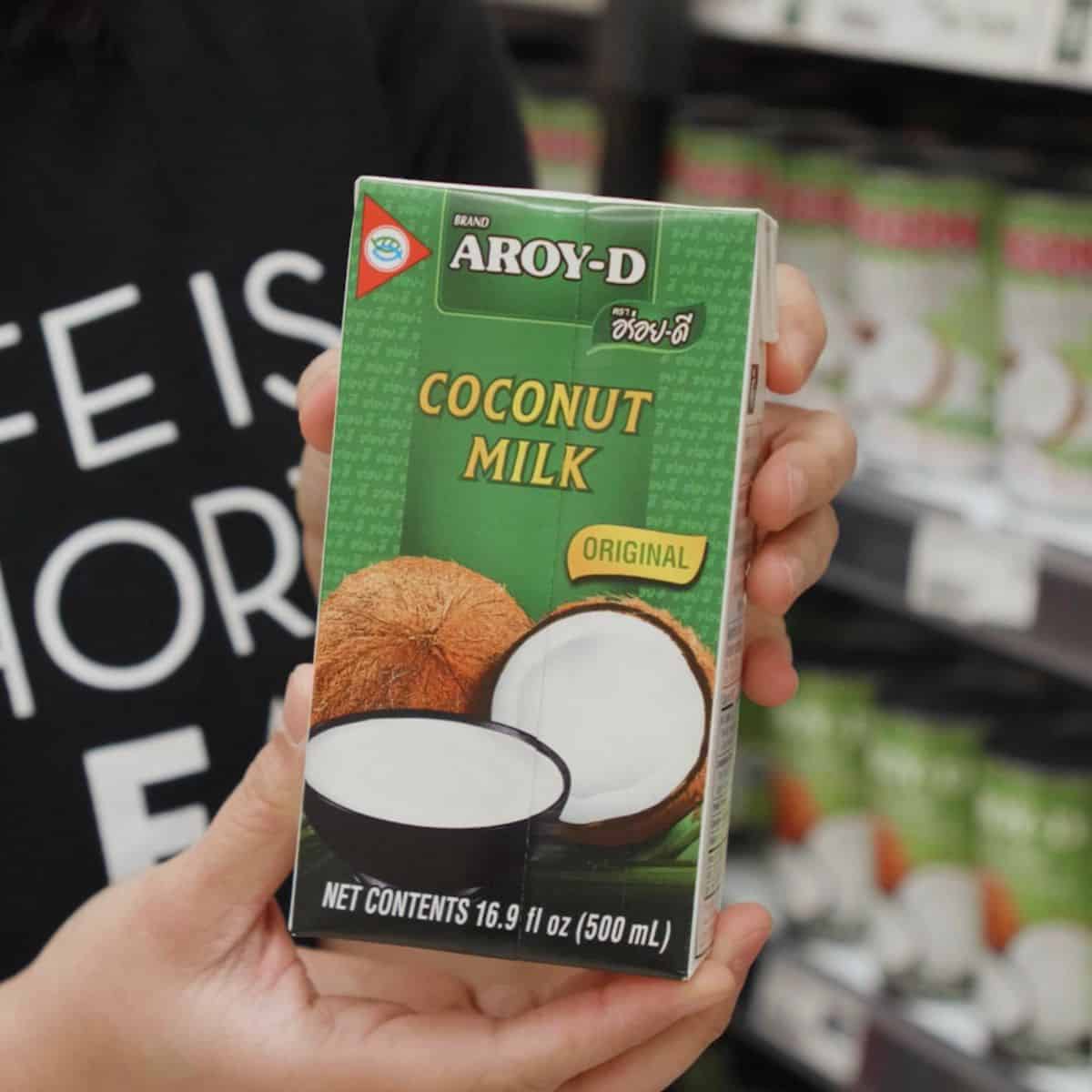 a carton of Aroy D coconut milk