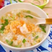 a bowl of rice soup with shrimp
