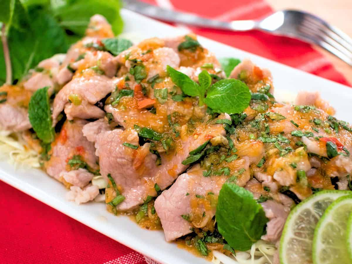 a plate of moo manao on red napkin