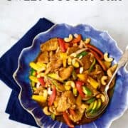 Sweet and sour pork on a blue plate with text "healthier no-fry sweet and sour pork" and "hotthaikitchen.com"